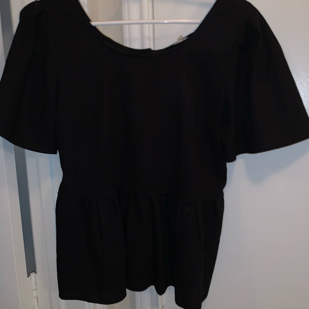 Black peplum top runs small fits like a medium